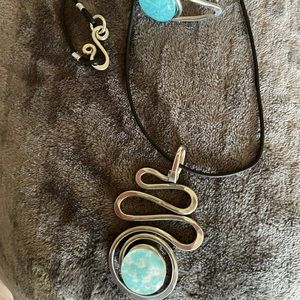 Artist made - Aqua blue ocean pendant on leather cord with matching bracelet.